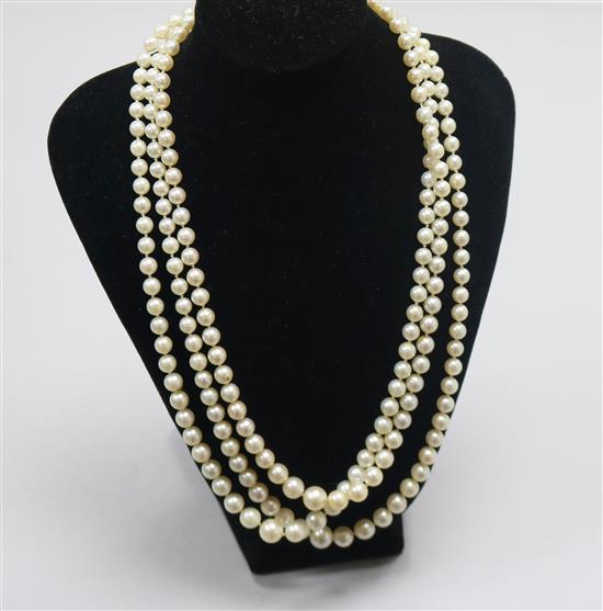 A triple strand graduated cultured pearl necklace, with 9ct gold circular clasp, 46cm.